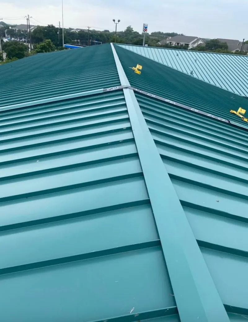 Green commercial metal roof ridge and valley for Metal Roof Repair in Sioux City